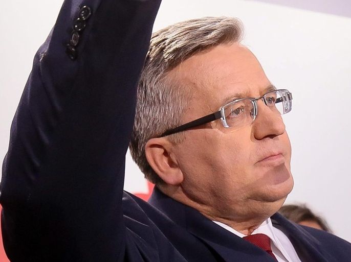 Poland's president and presidential candidate Bronislaw Komorowski after the first projections during the presidential elections night in Warsaw, Poland, 24 May 2015. Conservative challenger Andrzej Duda looks set to be elected Poland's next president, ousting incumbent Bronislaw Komorowski, initial projections following 24 May's run-off election show. Duda had captured 53 per cent of the vote, initial projections said. EPA/PAWEL SUPERNAK POLAND OUT