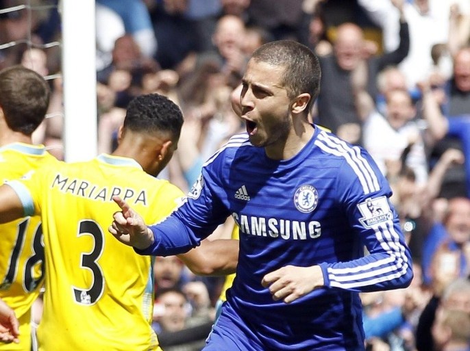Chelsea's Belgian midfielder Eden Hazard celebrates after scoring during the English Premier League football match between Chelsea and Crystal Palace at Stamford Bridge in London on May 3, 2015. AFP PHOTO / IAN KINGTONRESTRICTED TO EDITORIAL USE. No use with unauthorized audio, video, data, fixture lists, club/league logos or live services. Online in-match use limited to 45 images, no video emulation. No use in betting, games or single club/league/player publications.