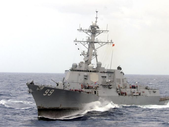 The guided-missile destroyer USS Farragut is shown in this undated photo operating in heavy seas in the Atlantic Ocean. Iranian forces boarded a Marshall Islands-flagged cargo ship in the Gulf on Tuesday after patrol boats fired warning shots across its bow and ordered it deeper into Iranian waters, the Pentagon said. The closest U.S. warship was more than 60 miles away, he said, and the U.S. military instructed destroyer USS Farragut to head towards the cargo ship, which was passing through the Strait of Hormuz at the time. REUTERS/Aaron Chase/U.S. Navy/Handout FOR EDITORIAL USE ONLY. NOT FOR SALE FOR MARKETING OR ADVERTISING CAMPAIGNS. THIS IMAGE HAS BEEN SUPPLIED BY A THIRD PARTY. IT IS DISTRIBUTED, EXACTLY AS RECEIVED BY REUTERS, AS A SERVICE TO CLIENTS