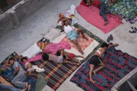 FILE - In this May 29, 2015 file photo, Indians sleep on the roof of a house to beat the heat in New Delhi, India. Even for a world getting used to wild weather, May seems stuck on strange. Torrential downpours in Texas, whiplashing the region from drought to flooding. A heatwave that has already killed more than 1800 in India and is the fifth deadliest since 1900. Record 91 degree temperature in of all places Alaska. A pair of top-of-the-scale typhoons in the Northwest Pacific. And a drought in the U.S. East is starting to take root just as the one ends in Texas. (AP Photo/Tsering Topgyal, File)
