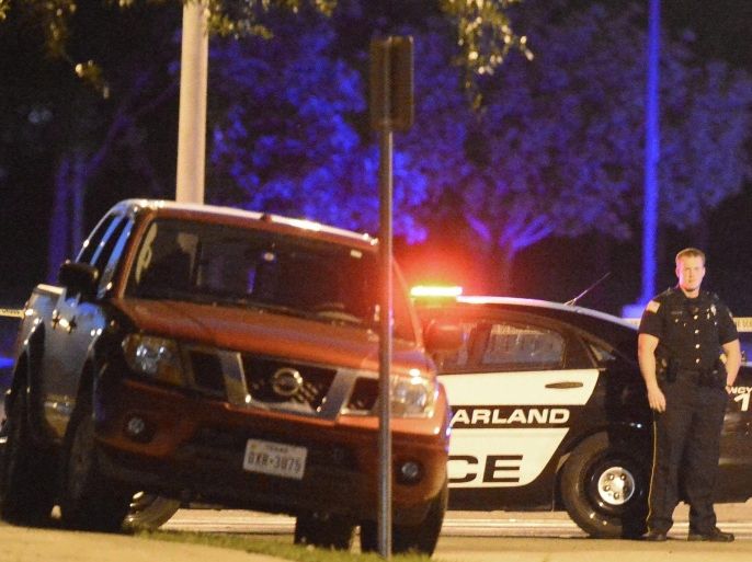 Police stand guard near the shooting suspects pickup truck, after two men drove up and started shooting at police as the Dutch parliamentarian and leader of far-right Party for Freedom, Geert Wilders, delivered a keynote address at the Muhammad Art Exhibit and Contest at the Curtis Culwell Center in Garland, Texas, USA, 03 May 2015. The art exhibit is being put on by the Pamela Geller's American Freedom Defense Initiative.