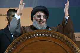 FILE - In this Aug. 2, 2013, file photo, Hezbollah leader Sheikh Hassan Nasrallah gestures during a rally to mark Jerusalem day or Al-Quds day, in the southern suburb of Beirut, Lebanon. Hezbollah's leader, Sheikh Hassan Nasrallah, said in a televised speech late Tuesday May 5, 2015, that his group will attack militants in Qalamoun, adding that "time will tell" when the battle will become full blown. He added that there will be no formal announcement before the widely anticipated battle begins. Hezbollah fighters captured a Syrian village Tuesday near the border with Lebanon after intense fighting with Islamic militants, the group's television station said, while an activist said battles are concentrating near a strategic Syrian hill. (AP Photo/Hussein Malla, File)