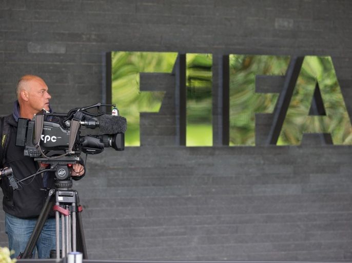 ZURICH, SWITZERLAND - MAY 27: A cameraman attends a press conference at the FIFA headquarters on May 27, 2015 in Zurich, Switzerland. Swiss police on Wednesday raided a Zurich hotel to detain top FIFA football officials as part of a US investigation.