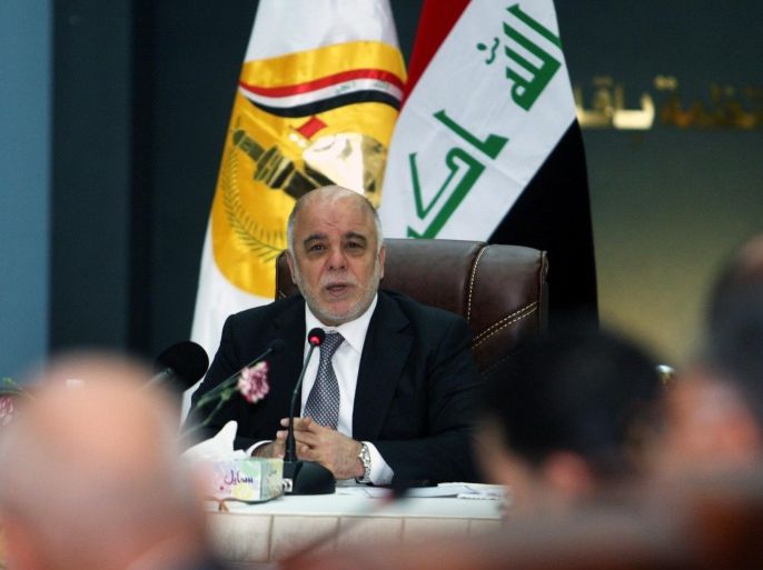 Iraqi Prime Minister, Haider al-Abadi (C), meets with Iraq's provinccial governors in Karbala, southern Iraq, 27 April 2015. Al-abadi arrived in Karbala to chair the Board of Governors and heads of the Iraqi provincial council meetings according to reports to discuss plans to transfer powers from ministries to local governments.
