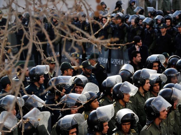 Members of the Iranian police stand guard during a demonstration expressing solidarity with murdered American Muslims, in front of the Swiss embassy in Tehran, Iran, 18 February 2015. Deah Shaddy Barakat, his wife Yusor Mohammad Abu-Salha and her sister Razan Mohammad Abu-Salha were found dead 10 February in their flat in the North Carolina university town of Chapel Hill, their neighbor Craig Hicks stands accused of their murder.