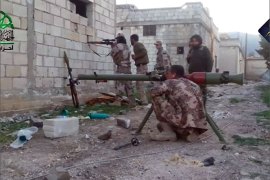 قوات المعارضة تطارد فلول النظام السوري في جسر الشغور