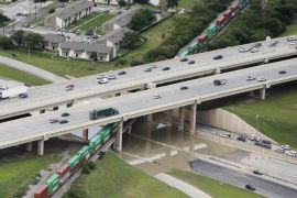 North and south bound Loop 12 at Interstate 30 is shutdown due to high water on the roadway, Friday, May 29, 2015, in Dallas. Floodwaters submerged Texas highways and threatened more homes Friday after another round of heavy rain added to the damage inflicted by storms. (AP Photo/Brandon Wade)