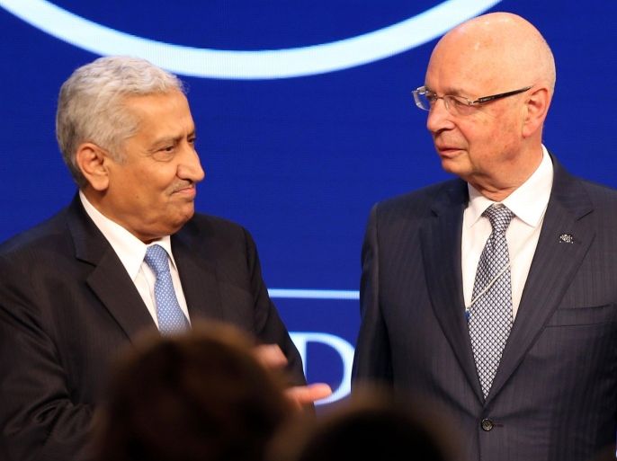The founder and executive chairman of the World Economic Forum (WEF), German Klaus Schwab (R), speaks with Jordanian Prime Minister Abdullah Nsur on the last day of the World Economic Forum (WEF) on the Middle East and North Africa 2015 on May 23, 2015 in the Dead Sea resort of Shuneh, west of the Jordanian capital, Amman. AFP PHOTO / KHALIL MAZRAAWI