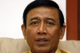 Former Indonesian Military Chief Wiranto gestures during an interview with Reuters in Jakarta September 23, 2008. Retired General Wiranto, a controversial figure over rights abuses in East Timor who looks set to run for president next year, said his country needs to spread its wealth among the poor.