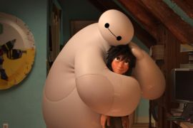 FILE - This file image released by Disney shows animated characters Hiro Hamada, voiced by Ryan Potter, right, and Baymax, voiced by Scott Adsit, in a scene from "Big Hero 6." For the second year in a row, Disney Animation won an Oscar for best animated feature, as “Big Hero 6” followed up last year’s “Frozen” win. (AP Photo/Disney, File)