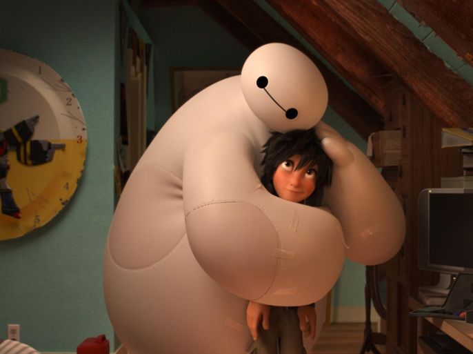 FILE - This file image released by Disney shows animated characters Hiro Hamada, voiced by Ryan Potter, right, and Baymax, voiced by Scott Adsit, in a scene from "Big Hero 6." For the second year in a row, Disney Animation won an Oscar for best animated feature, as “Big Hero 6” followed up last year’s “Frozen” win. (AP Photo/Disney, File)