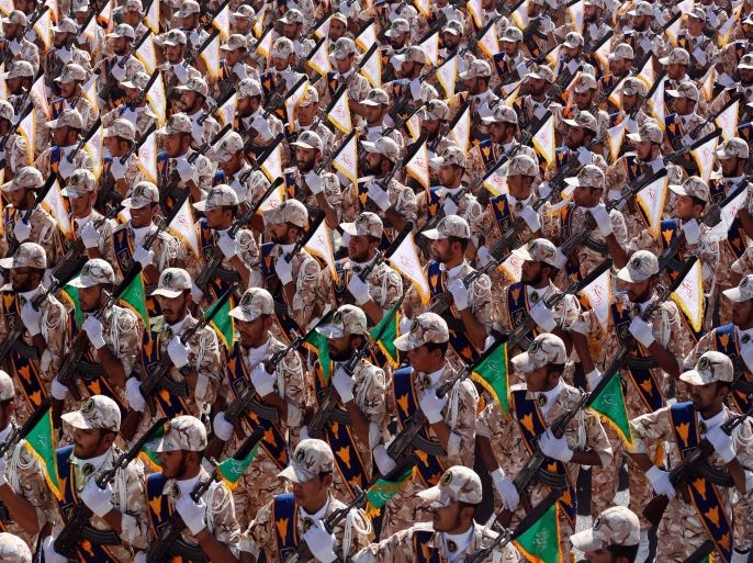 Iranian Revolutionary Guards march during the annual military parade marking the Iraqi invasion in 1980, which led to a eight-year-long war (1980-1988) in Tehran, Iran, 22 September 2014. The Iranian President said that Iran would not get back even one step of its right about a peaceful nuclear programm.