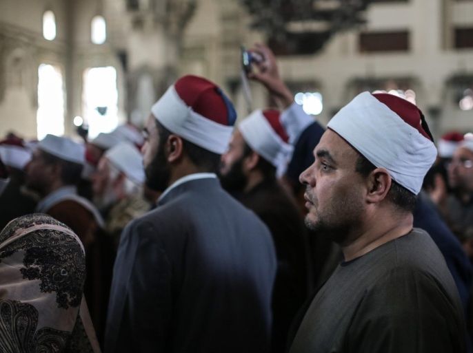 Egyptian clerics from Al-Azhar institution rally to denounce terrorism and show solidarity with the Egyptian government and security forces at a mosque in central, Cairo, Egypt, Tuesday, Feb. 3, 2015. Egyptian President Abdel Fattah al-Sissi told the nation in a televised address Saturday to prepare for a long fight to defeat Islamic extremists following a wave of attacks on security forces in the Sinai Peninsula. An Islamic State-linked group in Egypt claimed responsibility for a string of bomb and gun attacks last week targeting Egyptian military positions that killed at least 30 security force members. (AP Photo/Mosa’ab Elshamy)
