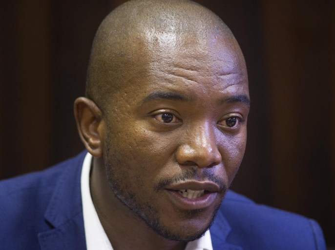 Mmusi Maimane, Parliamentary leader of the official opposition Democratic Alliance (DA), addresses a press conference on February 13, 2015, in Cape Town. The DA walked out of the opening session of the South African parliament a day before, in protest against the action of the Speaker of Parliamnet, Baleka Mbete. AFP PHOTO / RODGER BOSCH