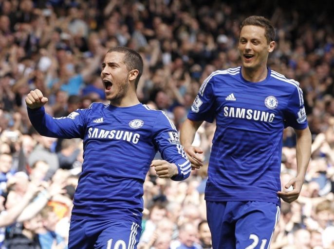 Chelsea's Belgian midfielder Eden Hazard (L) celebrates with Chelsea's Serbian midfielder Nemanja Matic after scoring during the English Premier League football match between Chelsea and Crystal Palace at Stamford Bridge in London on May 3, 2015. AFP PHOTO / IAN KINGTONRESTRICTED TO EDITORIAL USE. No use with unauthorized audio, video, data, fixture lists, club/league logos or live services. Online in-match use limited to 45 images, no video emulation. No use in betting, games or single club/league/player publications.
