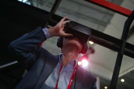 A visitor tests an Oculus VR Inc. virtual reality headset at the Mobile World Congress in Barcelona, Spain, on Tuesday, March 3, 2015. The event, which generates several hundred million euros in revenue for the city of Barcelona each year, also means the world for a week turns its attention back to Europe for the latest in technology, despite a lagging ecosystem.