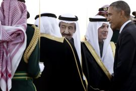 FILE - In this Tuesday, Jan. 27, 2015 file photo, President Barack Obama is greeted by new Saudi King Salman bin Abdul Aziz as the president and first lady Michelle Obama arrive on Air Force One at King Khalid International Airport, in Riyadh, Saudi Arabia. It is not just the Saudi king who will be skipping the Camp David summit of U.S. and allied Arab leaders. Most Gulf heads of state won't be there. The absences will put a damper on talks that are designed to reassure key Arab allies, and almost certainly reflect dissatisfaction among leaders of the six-member Gulf Cooperation Council with Washington's handling of Iran and what they expect to get out of the meeting. (AP Photo/Carolyn Kaster, File)