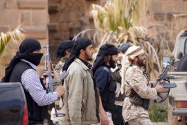DARAA, SYRIA - MARCH 25: Members of Syrian opposition group 'Southern Front' linked to Free Syrian Army are seen in Bushra ancient city after seizing the Busra al-Sham town of Daraa, Syria on March 25, 2015.