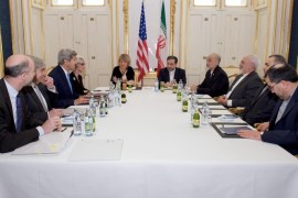 A handout picture provided by the US Department of State shows US Secretary of State John Kerry (3-L) flanked by National Security Council Senior Director for Iran, Iraq, Syria and the Gulf States Robert Malley (L), US Energy Secretary Dr. Ernest Moniz (2-L), Under Secretary of State for Political Affairs Wendy Sherman (4-L), and European Union Deputy Secretary General Helga Schmid (C-L), sits across from Iranian Foreign Minister Javad Zarif (3-R), Dr. Ali Akbar Salehi, the Vice President of Iran for Atomic Energy and President of the Atomic Energy Organization of Iran (4-R), and other advisors, during a meeting on Irans nuclear programme in Vienna, Austria, 30 June 2015. Following 13 years of on-off negotiations and several extensions of talks, Iran and the group of Britain, China, France, Russia, the United States and Germany agreed to seal an agreement by June 30 that would oblige Tehran to curb its nuclear activities, in exchange for sanctions relief. The group of six wants to limit Iran's civilian nuclear programme, out of fear that it could be used to produce weapons material. Tehran denies that it seeks nuclear weapons. EPA/US DEPARTMENT OF STATE/HANDOUT