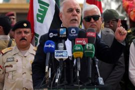 A handout picture released by the Iraqi Prime Minister's office shows Iraqi Prime Minister Haider al-Abadi (C) delivering a spech to Iraqi soldiers and Sunni volunteers at Habbaniyah base in eastern Ramadi city, west of Iraq, 08 April 2015. Al-Abadi arrived in Ramadi city and met with local officials and announced that the next battle will be in Anbar province. Media reports state that the prime minister visited the Habbaniyah base to see the preparations for the Liberation of the province from the control of Islamic state militia (IS) and distributed weapons to Sunni volunteers who will participate in the liberation of Anbar province from the control of Islamic state fighters. EPA/IRAQI PRIME MINISTER OFFICE / HANDOUT