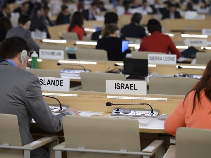 Israelian seat at the Human Right Council remains empty during the presentation of the report of the Commission of Inquiry on the 2014 Gaza conflict on June 29, 2015 at the United Nations Office in Geneva. Both Israel and Palestinian militants may have committed war crimes during last year's Gaza war, a widely anticipated United Nations report said. AFP PHOTO / FABRICE COFFRINI