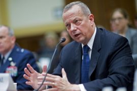 Retired General John Allen, the special presidential envoy for the global coalition against Islamic State, right, speaks during a House Foreign Affairs Committee hearing with Brigadier General Michael Fantini, Middle East principal director with the Office of the Assistant Secretary of Defense for International Security Affairs, in Washington, D.C., U.S., on Thursday, March 26, 2015. The U.S. and allies began airstrikes on the Iraqi city of Tikrit, supporting Iranian-backed Shiite militias seeking to expel Islamic State fighters from the area. Asked whether Iran could end up controlling Iraq, Allen said, 'I don't think that's going to be the case. In the end, Iraq is an Arab country.' Iranians, he said, 'are a different people.'