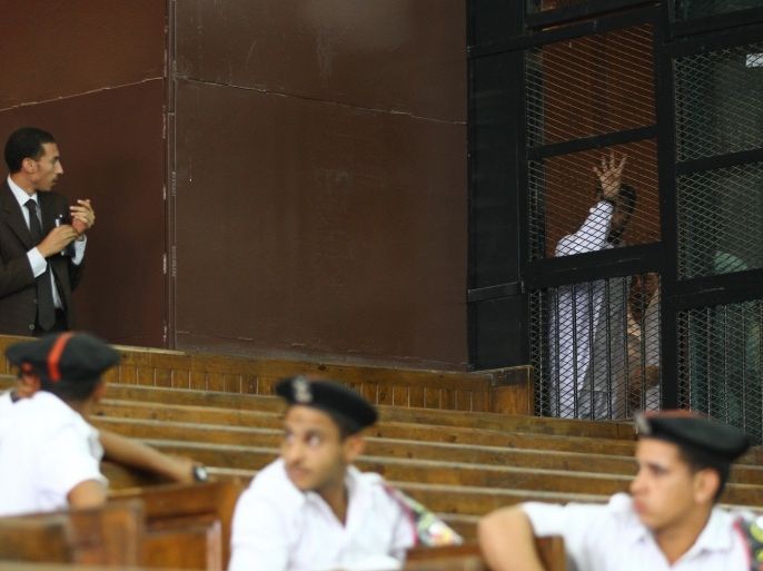 اغسطس 2014 من جلسة لقضية غرفة عمليات رابعة-الأمن يتواجد بكثافة داخل قاعات المحاكم بعد الانقلاب العسكري