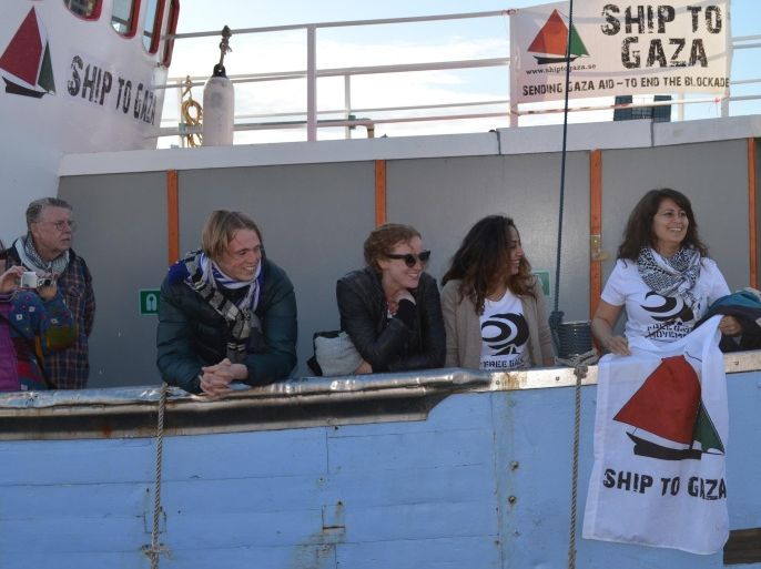 COPENHAGEN, DENMARK - MAY 15: Swedish and Norwegian activists trying to break the blockade on Gaza, on a fishing boat named 'Ship to Gaza' depart from the Swedish Gothenburg comes to Islands Brygge harbourfront in Copenhagen on May 15, 2015. Member of parliament for the Socialist People's Party Ozlem Cekic (R) is among the thirteen activists who plan to reach Gaza with humanitarian aid on a fishing boat 'Marianne' in mid June.