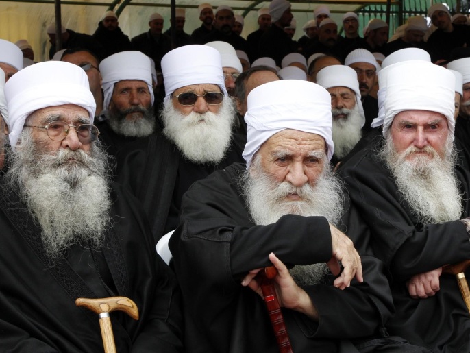 Druze clerics attend the funeral ceremony of top Druze cleric Sheikh Ahmed Salman al-Hajri in al-Suwayda city March 27, 2012. Hajri died in a car accident when the car he was travelling in collided with another car in southern Syria, on Saturday.