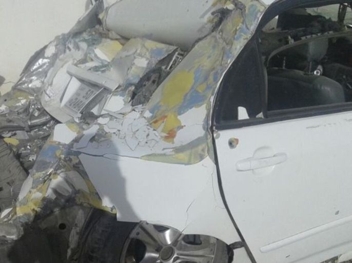 سيارة أحد المطلوبين بعد أن حطمتها قوات الأمن في معان الشهر الماضي حسب شهود عيان