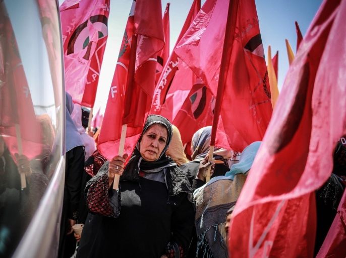 GAZA CITY, GAZA - JUNE 04: A group of Palestinians protest the invasion of Palestinian territories outside the United Nations office on the 48th anniversary of the 1967 Palestinian exodus in Gaza City, Gaza on June 4, 2015.