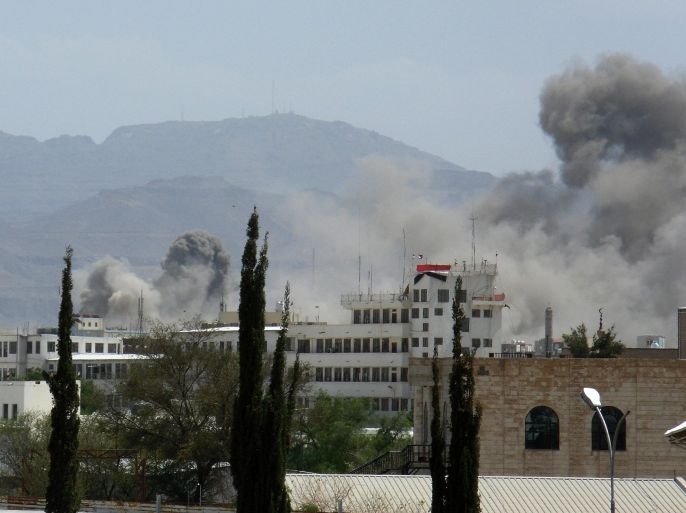 Smoke rises after a Saudi-led airstrike hit a site believed to be one of the largest weapons depot on the outskirts of Yemen's capital, Sanaa, on Wednesday June 3, 2015. The airstrikes and ground fighting have killed more than 1,000 civilians and displaced a half million people, according to the U.N. (AP Photo/Hani Mohammed)