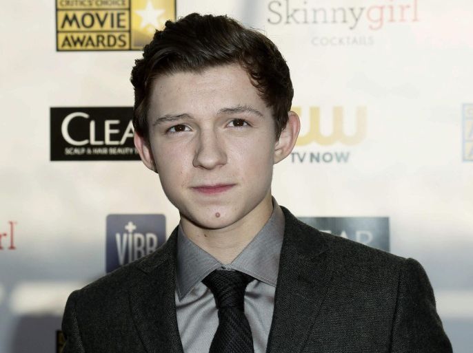 Actor Tom Holland from "The Impossible" arrives at the 2013 Critic's Choice Awards in Santa Monica, California in this January 10, 2013 file photo. Holland is set to play the superhero in the next "Spider Man" franchise, according to Sony Pictures Motion Picture Group. REUTERS/Danny Moloshok/Files