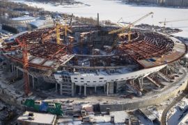 In this aerial view the construction site of the new Zenit Stadium (among proposed names are Zenit Arena or Gazprom Arena) which will host matches of the 2018 World Cup in St.Petersburg, Russia, Monday, Feb. 16, 2015. The 2018 FIFA World Cup Russia Local Organising Committee (Russia 2018 LOC) is holding its 5th Management Board meeting with FIFA participation in St.Petersburg. The Board’s role is to jointly govern the preparations for FIFA World Cup 2018. (AP Photo/Dmitry Lovetsky)
