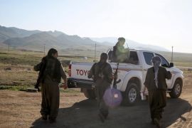 Kurdistan Workers Party (PKK) fighters leave their base in Sinjar, March 10, 2015. Women fighters at a PKK base on Mount Sinjar in northwest Iraq, just like their male counterparts, have to be ready for action at any time. Smoke from the front line, marking their battle against Islamic State, which launched an assault on northern Iraq last summer, is visible from the base. Many of the women have cut links with their families back home; the fighters come from all corners of the Kurdish region. REUTERS/Asmaa Waguih PICTURE 32 OF 32 FOR WIDER IMAGE STORY "KURDISH WOMEN BATTLE ISLAMIC STATE" .SEARCH "WAGUIH PKK" FOR ALL IMAGES