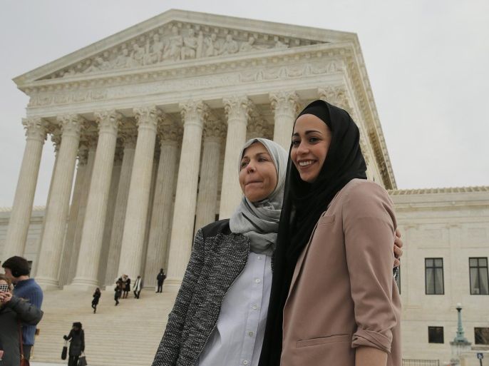Muslim woman Samantha Elauf (R), who was denied a sales job at an Abercrombie Kids store in Tulsa in 2008, stands with her mother Majda outside the U.S. Supreme Court in Washington, February 25, 2015. The Court on Wednesday considered whether Elauf, who wears a head scarf, or hijab, was required to specifically request a religious accommodation at her job interview at the store in Tulsa in 2008 when she was 17. The company denied Elauf the job on the grounds that wearing the scarf violated its "look policy" for members of the sales staff. REUTERS/Jim Bourg (UNITED STATES - Tags: POLITICS LAW BUSINESS EMPLOYMENT RELIGION)