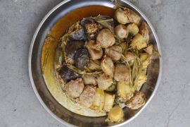 Dolma, a traditional Iraqi dish of vegetables and vine leaves stuffed with meat, rice and tomatoes, which Hussain Hawi Warid, 55, likes to break his fast with is seen in Baghdad, July 30, 2014. During Ramadan, the ninth and holiest month in the Islamic calendar, Muslims refrain from eating and drinking during daylight hours. Reuters photographers took a series of portraits of Muslims observing Ramadan in different countries around the world, and asked them what food they liked to eat when breaking their daily fast. Eid-al-Fitr, marking the end of Ramadan, will be celebrated at the beginning of next week. Picture taken July 30, 2014. REUTERS/Ahmed Saad (IRAQ - Tags: SOCIETY RELIGION FOOD)ATTENTION EDITORS: PICTURE 04 OF 16 FOR PACKAGE 'RAMADAN - BREAKING MY FAST' TO FIND ALL IMAGES SEARCH 'GLOBAL FAST'