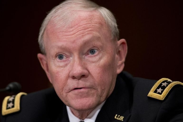 In this photo taken May 6, 2015, Joint Chiefs Chairman Gen. Martin Dempsey testifies on Capitol Hill in Washington. The Obama administration is nearing a decision on how to improve and accelerate training of Iraqi security forces in light of recent setbacks against the Islamic State, including the possibility of new training camps that likely would require a bigger U.S. troop presence, U.S. officials said Tuesday. Dempsey said he has recommended changes to President Barack Obama but he offered no assessment of when decisions would be made. (AP Photo/Manuel Balce Ceneta)