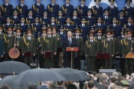 Russian President Vladimir Putin (C) takes a speech opening the International Military-Technical Forum 'ARMY-2015' in the Russian Armed Forces 'Patriot' park in Kubinka, Moscow region, Russia, 16 June 2015. Hundreds of the Russian defense companies and weapon manufacturers will take part in the event, displaying an estimated 5,000 pieces of weaponry and military equipment, ranging from helicopters and fighter jets to tanks and small arms.