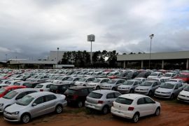 New cars are parked at a stock area of German automaker Volkswagen's plant in Taubate, Brazil, June 19, 2015. Volkswagen AG Taubate plant, the second largest in Brazil, which produce the top-selling Gol hatchback, the Voyage sedan and the Up city car has furloughed 4,200 workers for three weeks, a local union said on June 15, 2015, as disappearing demand forces carmakers in the country to manage excess capacity. Brazil's auto industry is expecting this year's downturn to be its worst since 1998, according to national automakers association Anfavea, which slashed its 2015 outlook for the second time in two months. REUTERS/Paulo Whitaker