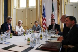 From left, U.S. Secretary of Energy Ernest Moniz, U.S. Secretary of State John Kerry and U.S. Under Secretary for Political Affairs Wendy Sherman meet with Iranian Foreign Minister Mohammad Javad Zarif, second from right, at a hotel in Vienna, Austria, Saturday, June 27, 2015. After nearly a decade of international diplomacy, negotiators are trying to reach a final agreement by Tuesday that would curb Iran's nuclear activities for a decade and put tens of billions of dollars back into the Iranian economy through the easing of financial sanctions. (Carlos Barria/Pool Photo via AP)