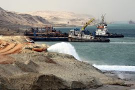 Dredgers work on a section of the New Suez Canal in Ismailia, Egypt, 13 June 2015. According to reports, Egypt has set the date for opening of the New Suez Canal for 06 August 2015.