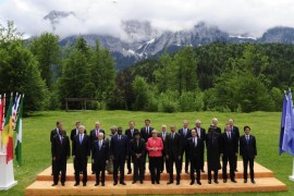 (1st row L-R) Ethiopia's Prime Minister Hailemariam Desalegn, Canada's Prime Minister Stephen Harper, Tunisia's President Beji Caid Essebsi, Senegal's President Macky Sall, Liberia's President Ellen Johnson Sirleaf, Germany's Chancellor Angela Merkel, US President Barack Obama, French President Francois Hollande, Nigerian President Muhammadu Buhari, British Prime Minister David Cameron and Japanese Prime Minister Shinzo Abe (2nd row L-R) Director-General of the World Trade Organization Roberto Azevedo, OECD secretary general Jose Angel Gurria, Chair of the Commission of the African Union Dlamini Zuma, United Nations Secretary-General Ban Ki-moon, Italy's Prime Minister Matteo Renzi, Iraq's Prime Minister Haider al-Abadi, President of the European Council Donald Tusk, European Union Commission President Jean-Claude Juncker, IMF Managing Director Christine Lagarde and World Bank Group President Jim Kim pose for the traditional family picture after a so-called 'outreach meeting' at the Elmau Castle near Garmisch-Partenkirchen, southern Germany, on June 8, 2015 on the second day of the end of a G7 summit. Germany hosts a G7 summit at the Elmau Castle on June 7 and June 8, 2015. AFP PHOTO / ROBERT MICHAEL