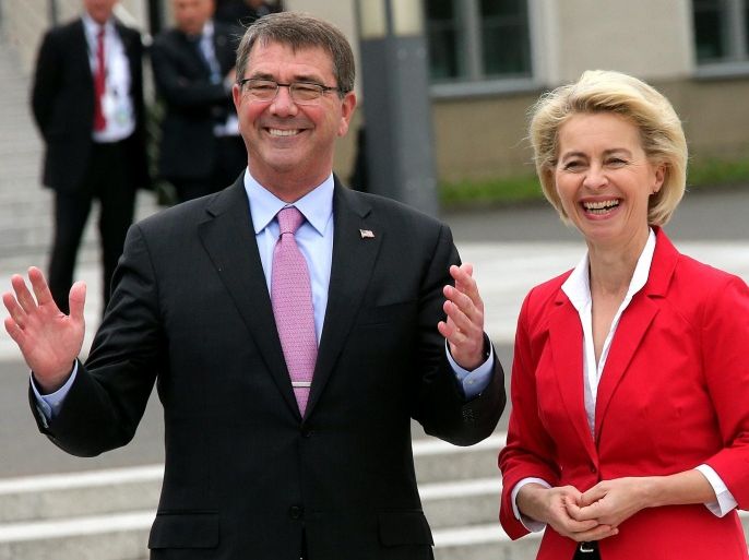 German Minister for Defence Ursula von der Leyen (R) and US Secretary of Defence Ashton Carter (L) smile towards the media as they pose prior to their meeting in Berlin, Germany, 22 June 2015.