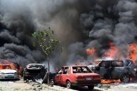 Smoke and flames rise above a burning cars at the scene of a bombing targeting the convoy of the Egyptian Prosecutor General, in a northern suburb of Heliopolis, Cairo, Egypt, 29 June 2015. According to reports Egypt's Prosecutor General, Hisham Barakat, is receiving treatment in hospital for injuries to his face and shoulder. Two of his guards and a civilian were also injured in the incident on Barakat's route between his office and home which left at least five cars destroyed. In an uncorroborated statement the group calling themselves the Giza Popular Resistance have claimed responsibility.