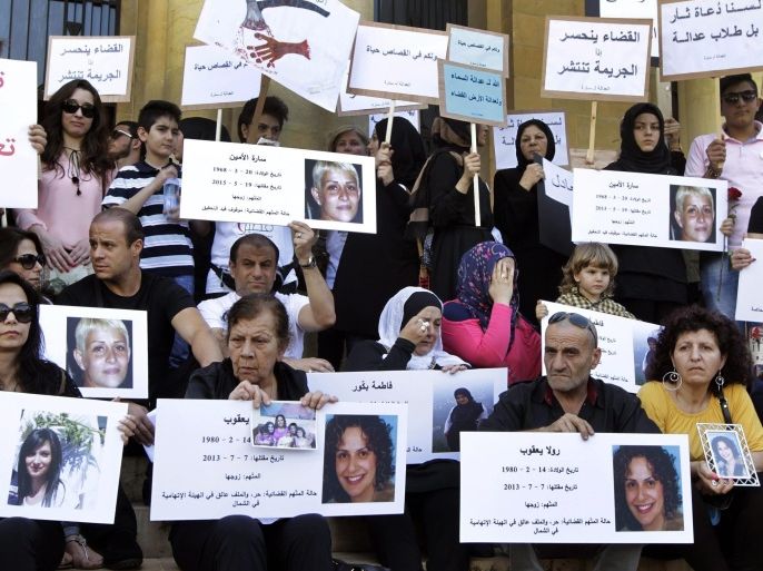 Mothers and relatives of the victims of domestic violence carry pictures of victims and shout slogans during a demonstration demanding domestic abuse law reform held between the National Museum to the Palace of Justice in Beirut, Lebanon, 30 May 2015. According to reports thousands joined the march demanding protection from domestic violence be better enshrined in law in the country where women were not protected until the law of 01 April 2014, which in itself was controversial due to the narrow definitions employed amid concerns it was amended under pressure from relgious groups and has been widely considered deficient in the way it has been implemented.