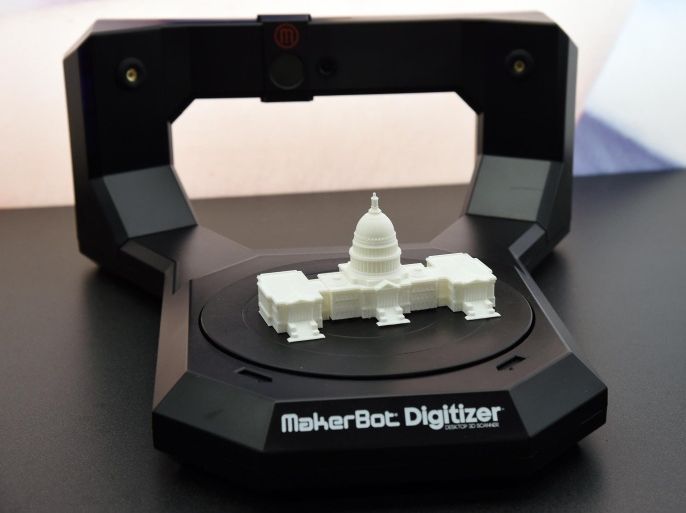 LAS VEGAS, NV - JANUARY 06: A MakerBot Digitizer desktop 3D scanner is displayed with a miniaturized Capitol Building on it at the 2015 International CES at the Sands Expo and Convention Center on January 6, 2015 in Las Vegas, Nevada. The scanner turns 3D objects into computer files so a 3D printer can copy them. CES, the world's largest annual consumer technology trade show, runs through January 9 and is expected to feature 3,600 exhibitors showing off their latest products and services to about 150,000 attendees.