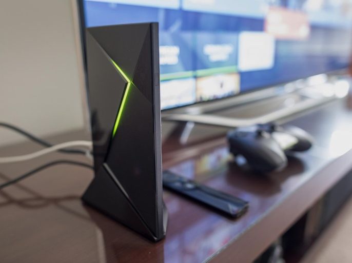 The Nvidia Corp. Shield game console system is arranged for a photograph in San Francisco, California, U.S., on Friday, May 22, 2015. Cloud gaming, which allows players to stream games almost instantly over the Internet instead of buying discs or waiting for lengthy downloads, is at the heart of the Nvidia Shield, and proponents say it could do to traditional game consoles what Netflix did to Blu-ray.
