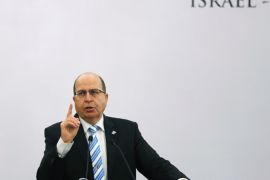 Israeli Defence Minister Moshe Ya'alon gestures while addressing a gathering during a lecture themed "Israel-India Partnership in the 21st Century"�, in New Delhi February 19, 2015. Ya'alon arrived in India on Wednesday to help sell his country's arms industry to the world's largest defence importer and promote deepening military ties between the two nations. REUTERS/Adnan Abidi (INDIA - Tags: MILITARY POLITICS BUSINESS)