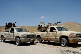 A handout picture made available by the official Syrian Arab News Agency (SANA) on 06 June 2015 is described as showing Syrian army soldiers and Hezbollah members on armed pick-up trucks in the Flita height in the Qalamoun mountains at the Syrian-Lebanese border, on 06 June 2015. The Syrian army and Hezbollah fighters reportedly made advances on 05 June against Islamist rebels in the region of Qalmun near the border with Lebanon, activists and the Shiite movement said. They regained control of Zahweh Plains, a stronghold of Islamist militants led by the al-Qaeda-linked al-Nusra Front on the outskirts of the Lebanese town of Arsal. The Syrian Observatory for Human Rights monitoring group reported territorial gains by the Syrian army and Hezbollah in Qalmun, while pro-Syrian al-Mayadeen TV showed footage of deserted posts which it said belonged to al-Nusra in Zahweh Plains.